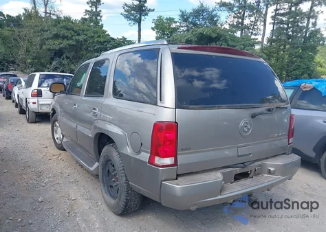 2003 Cadillac Escalade Standard z USA, uszkodzony, nr VIN 1GYEC63T53R257350